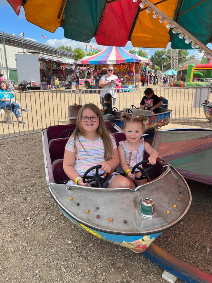 Enjoying rides at the Lyon County Fair