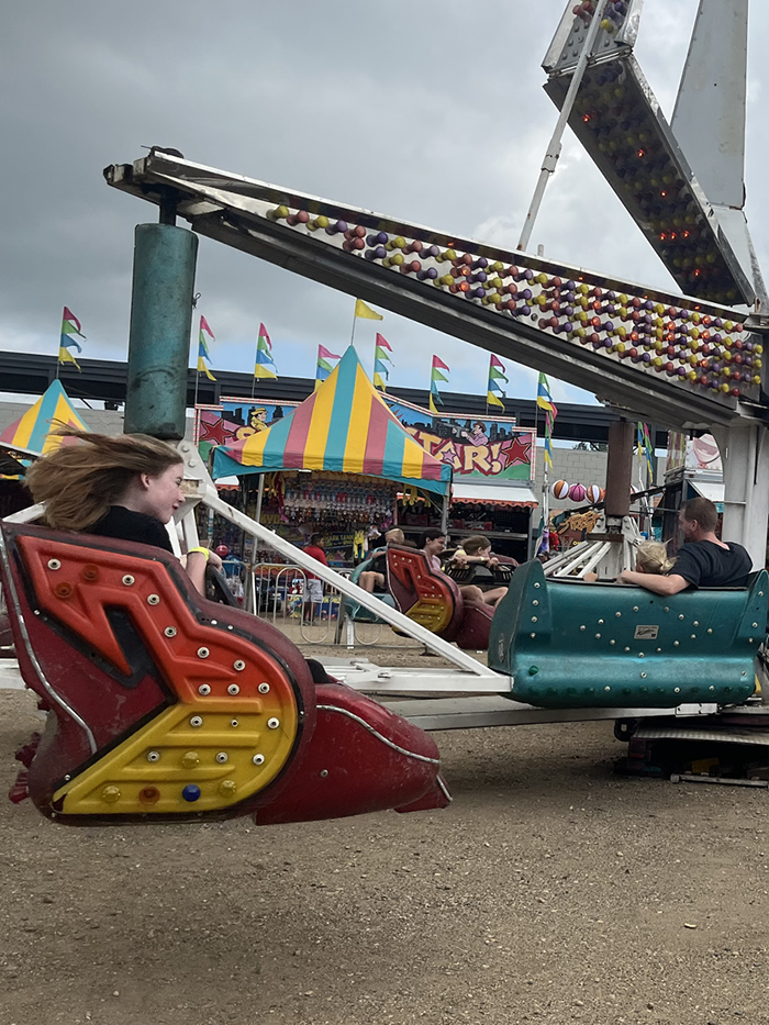 Enjoying rides at the Lyon County Fair